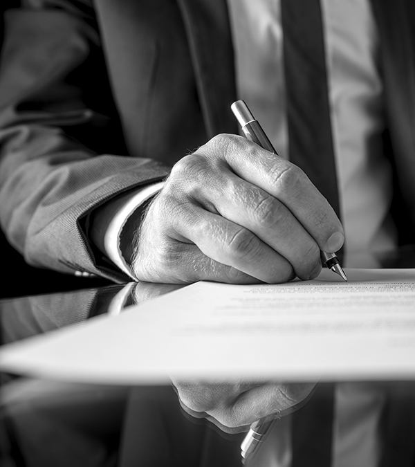 Businessman signing a document or contract